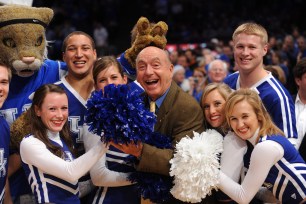 Dick Vitale takes a photo with the Cheerleaders of Kentucky during a 2009 game at The Garden.